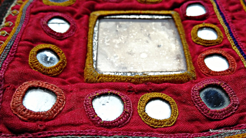 Probably mica? Or very old mirrors. Bought in Delhi, in a shop full of treasures from Rajasthan.