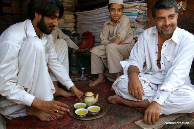 At the bazaar in peshawar, often invited for chai. May 2008, Pakistan