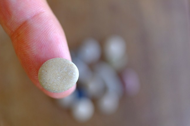 Small flat stones found along the coast in Spain